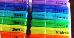 there are many different colored plastic containers with words in them that spell out long u, short u, and short u