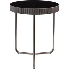 a round table with metal legs and black glass top