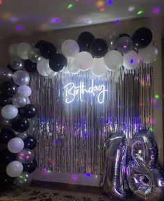 a birthday party with balloons and streamers