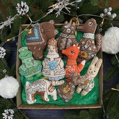 a box filled with christmas ornaments on top of a table