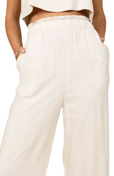 Easy and polished, these elastic-waist pants are crafted from lightweight linen with flowy wide legs. Elastic waist Side pockets Unlined 100% linen Hand wash, dry flat Imported Linen Bottoms With Elastic Waistband For Vacation, Chic Linen Bottoms With Elastic Waistband, Chic Flax Linen Bottoms, Chic Flax Colored Linen Bottoms, Vacation Linen Pants With Pull-on Style, Beach Linen Pants With Pull-on Style, Linen Pull-on Pants For Vacation, Pull-on Linen Pants For Vacation, Spring Linen Wide Leg Pants With Elastic Waistband