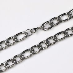 "Material: polished 316 stainless steel Closure: Lobester claw Chain style: Figaro Length : 19\"/23\"/27\" Message me for wholesale price" Stainless Steel Cuban Link Necklaces With Lobster Clasp, Stainless Steel Cuban Link Necklace With Lobster Clasp, Gunmetal Link Jewelry In Stainless Steel, Silver Stainless Steel Oval Link Chain Necklace, Stainless Steel Figaro Link Chain Jewelry, Silver Stainless Steel Figaro Chain Necklace, Silver Figaro Chain Jewelry In Stainless Steel, Silver Stainless Steel Necklace With Figaro Chain, Stainless Steel Chain Link Necklace With Lobster Clasp