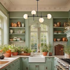 a kitchen filled with lots of green cupboards and white counter tops next to a sink