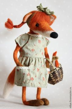 a stuffed animal dressed in a dress and holding a basket with carrots on it