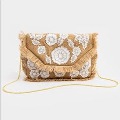 An Absolute Must Have This Season! This Clutch Features Embroidered Flowers And Fringed Trim, It Is Sure To Bring Together Any Spring Look! Summer Embellished Beige Bags, White Clutch Purse, Elephant Purse, Burgundy Clutch, Pink Flower Ring, Embroidered Clutch Bag, Navy Clutch, Tan Clutch, Heart Clutch