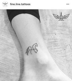 a small tattoo on the ankle of a woman's foot, depicting a horse