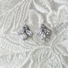 Marquise Leaf CZ Stud Earrings - Cassandra Lynne Classic Cluster Earrings With Sparkling Cubic Zirconia, Dainty Cubic Zirconia Bridal Earrings For Party, Hypoallergenic Cubic Zirconia Party Earrings, Hypoallergenic Cubic Zirconia Earrings For Party, Delicate Cubic Zirconia Bridal Earrings For Pierced Ears, Delicate Cubic Zirconia Bridal Earrings, Marquise Crystal Earrings For Gift, Delicate Silver Cubic Zirconia Crystal Earrings, Minimalist Cubic Zirconia Wedding Earrings