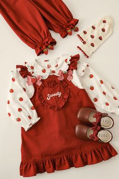 Strawberry Sweety Dress Red • 100% pure cotton • Carefully crafted strawberry embroidery labels, tied with ribbons as a commemorative gift • Fairy-flying sleeves and dancing shoulders adjustable straps for easy connection Sweety • The shape of sweet love Embroidery records cardiac signals. • Sweet and lovely strawberry webbing bow decoration with adjustable wooden ear straps • Love heart and letter embroidery on the chest with wooden ears; meticulous workmanship. • The hem of the skirt is pleate Strawberry Baby Outfit, Strawberry Outfit Ideas, Strawberry Orchard, Strawberry Nursery, Ear Decoration, Minimalist Baby Clothes, Strawberry Embroidery, Minimalist Clothes, Strawberry Shirt