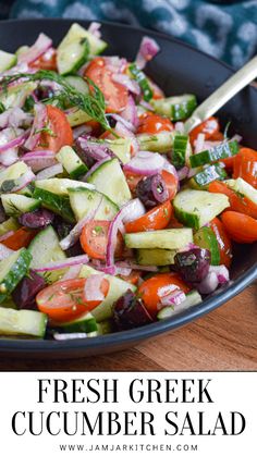 fresh greek cucumber salad in a black bowl