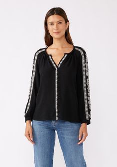 A classic boho blouse with long raglan sleeves and contrast embroidered detail throughout. Embroidered detail Relaxed fit Long raglan sleeve Single-button wrist closure Split v-neckline Bohemian blouse Dry clean recommended or hand wash cold Classically boho for any season, our effortlessly relaxed blouse is crafted from a viscose and linen blend. Featuring contrast embroidered details, long raglan sleeves, and a split v-neckline. Tuck this effortless everyday top into vintage denim and add a cl Western Buckles, Bohemian Blouses, Bohemian Tops, Boho Blouses, Free Spirit, Vintage Denim, Raglan Sleeve, Linen Blend, Relaxed Fit