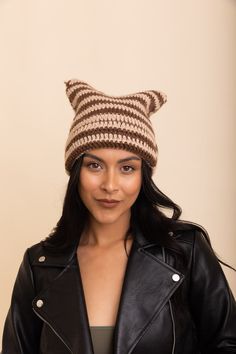 Stay warm and look cute in this purrfectly cozy cat ear crochet beanie! This comfy beanie features an adorable cat ear pattern, keeping you cozy and stylish all winter long. #completeyourlook #lovemyleto 100% Acrylic Imported Trendy Cat Ears Winter Hat, Trendy Winter Hat With Cat Ears, Trendy Winter Hats With Cat Ears, Trendy One Size Cat Ears Hat, Winter Beanie With Cat Ears, One Size Fits Most, Casual Cat Ears Beanie For Winter, Casual Warm Beanie With Cat Ears, Casual Knitted Beanie With Cat Ears, Casual Beanie With Cat Ears