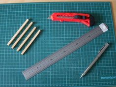 the tools needed to make a diy project are displayed on a green cutting mat