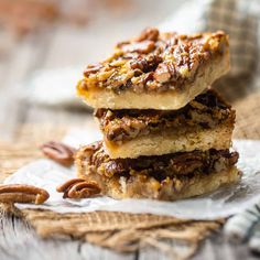 three pecan bars stacked on top of each other