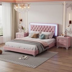 a bedroom with a pink bed, dressers and chandelier