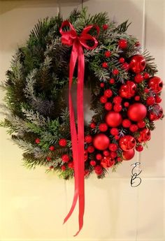 a christmas wreath hanging on the wall