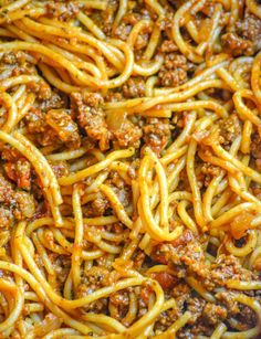 spaghetti with meat and sauce in a pan