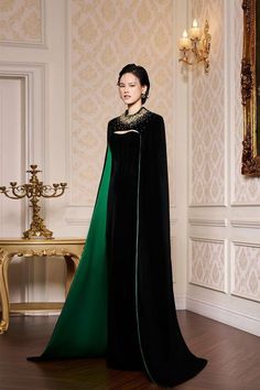 This stunning velvet dress features a strapless design and long cape sleeves, making it perfect for formal occasions. The elegant silhouette adds a touch of sophistication, while the soft fabric provides comfort and luxury. Elevate your style with this floor length dress. *Note: The length is measured from the shoulder to the shortest of the front.Length: XS: 157cm, S: 159cm, M/L/XL: 160cm, XXL: 162cm Velvet Floor Length Dress, Style Corset, Corset Gown, Long Cape, Happy Clothes, Strapless Bustier, Velvet Gown, Floor Length Dress, Corset Bustier