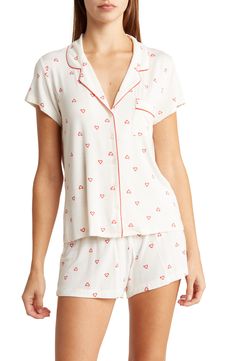 Get that chic put-together feel even in your jammies with this lightweight printed set. Top: 25" length (size S); Bottom: 10.5" rise, 3" inseam Top has notch lapel, short sleeves, and front patch pocket Bottom has elasticized waist and allover print 95% rayon, 5% spandex Machine wash Imported Model stats: 5'10", Bust: 32", Waist: 25", Hip: 36". Model is wearing size S. Lazy Clothes, Lazy Outfits, Sleepwear Robe, Patch Pocket, Nordstrom Rack, Pajama Set, Pajamas, Short Sleeves, Nordstrom