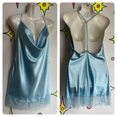 Pretty Blue  Slip Dress! Dreamgirl Cowl Neck Tags still attached. Size M *Make sure to compare your measurements for a good fit!  lightweight silky polyester. (97% poly 3% spandex) Would be cute worn as a dress or as a slip. bust: 38" waist: 32"  hips: 40" length: 31" (shoulder to hem) Adjustable Straps No stains or holes. Blue Fitted Slip Dress For Sleep, Blue Sleeveless Y2k Dress, Blue Silk V-neck Mini Dress, Blue V-neck Slip Dress For Sleep, Blue V-neck Nightgown For Beach, Vintage Blue Sheer Sleepwear, Blue Slip Dress, Cowl Neck, Dress Clothes For Women