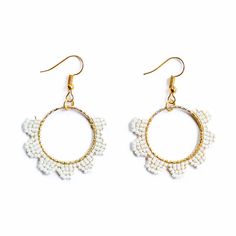 An off white flower with a gold circle made in miyuki glass beads. Gold Circle, White Flower, White Flowers, Glass Beads, Off White, Drop Earrings, Beads, Glass, Flowers