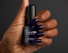 Starrily Wolfsbane Nail Polish: Overview:• Indigo purple jelly nail polish with a bright copper shimmer• Best applied in 2-3 coats Description: Wolfsbane is a highly toxic plant, in folklore it was used by witches in potions to repel werewolves. Inspired by its namesake, the powerful and mythical Wolfsbane plant, this polish weaves tales of ancient legends and forest whispers, painting a tale of indigo nights and shimmering copper dawns. ★ Certified vegan & cruelty-free nail polish★ Made in the Orly Nail Polish Plastic Jungle, Zoya Brown Nail Polish, Sparitual Nail Polish, Purple Gold Nail Polish, Cruelty Free Nail Polish, Zoya Purple Nail Polish, Bright Copper, Jelly Nails, Indie Nail Polish