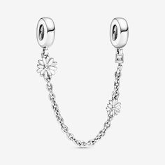 Keep your spring charm collection in place with the Pandora Moments Daisy Flower Safety Chain Charm. With two different-sized daisy flower details, the sterling silver safety chain makes sure that your charms stay safely on your Pandora Moments bracelet, while looking fresh and stylish. Featuring a single cubic zirconia for added sparkle, the daisy safety charm is inspired by the bold and freedom-loving symbolism of the delicate flower. Pair with other floral charms for the ultimate spring-inspired look. - Pandora Daisy Flower Safety Chain Charm - Sterling silver / Cubic Zirconia / Clear - Sz. 2 in Pandora Safety Chain, Pandora Daisy, Pandora Moments Bracelet, Dream Bracelet, Bracelet Pandora, Charm Collection, Safety Chain, Jewellery Uk, Spring Inspiration