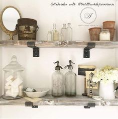 the shelves are filled with bottles, soaps and other bathroom items on display in front of a mirror