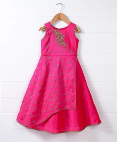 Let your little girl be ready for the next special occasion with this sleeveless ethnic gown. Made from soft fabric, this outfit features floral embroidery. Round neck ensures easy and fuss free dressing. SIZING TIP : * Please review the size chart for each outfit before making your size selection. more specifically look at the chest and length * If your child currently wears different sizes for top and bottom, please go with the smaller size of the two while picking the outfit FABRIC: Synthetic WHAT'S INCLUDED: One Piece Dress CARE: Dry Clean Only Summer Festive Anarkali Gown, Traditional Sleeveless Navratri Dresses, Bollywood Style Dresses For Navratri Celebration, Pink Sleeveless Embroidered Gown, Sleeveless Embroidered Dresses For Navratri, Sleeveless Embroidered Navratri Dress, Sleeveless Party Dress For Diwali, Sleeveless Anarkali Set For Eid Party, Pink Sleeveless Dress For Navratri