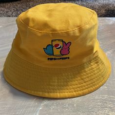 Never Worn! Cute Pepsi X Peep Embroidery. Unisex. Cute Yellow Hats For Vacation, Playful Yellow Sun Hat For Vacation, Trendy Yellow Bucket Hat For Summer, Playful Yellow Bucket Hat For The Beach, Playful Yellow Bucket Hat For Beach, Playful Yellow Cotton Hats, Vintage Yellow Sun Hat For The Beach, Cute Yellow Sun Hat For Spring, Trendy Yellow Sun Hat For Spring