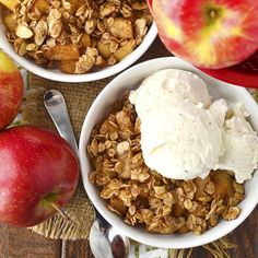 two bowls filled with granola and ice cream next to apples