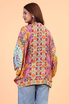 Elevate your wardrobe with our Wing sleeves floral knit kimono. Featuring the wing sleeves and open in front offering a flattering silhouette. Our cocoon kimono is perfect for an evening party adding a Boho chic vibe. Bohemian V-neck Cardigan With Floral Print, V-neck Patterned Kimono For Festival, Multicolor V-neck Kimono For Fall, Colorful Patterned Spring Kimono, Multicolor Open Front Cardigan For Spring, Multicolor Floral Print V-neck Kimono, Multicolor V-neck Kimono With Floral Print, Summer Multicolor Floral Print Cardigan, Multicolor Floral Print Kimono One Size