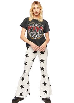 Badass tendencies! With a high rise and dramatic flare, these stretch bell bottoms make your legs look a mile long with retro-inspired style that feels cool and modern! These jeans come in white denim and feature a black star design that rounds up the `70s swagger of these bells. The vintage-inspired bell bottom jeans feature a zip fly closure, pockets at back and a raw hem. Flirty flare features a slender fit through hip and thigh with a dramatic flared leg. Available in sizes S, M and L. Made Beautiful Questions To Ask, Winter Flare Jeans Outfit, Memory Questions, Flare Jeans Outfit Casual, Goal Setting Questions, Meaningful Questions To Ask, Bonding Questions, Relationship Building Questions, Flare Jeans Outfit Winter