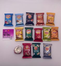 various snacks are laid out on a white surface