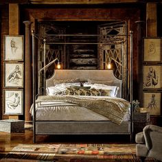 a large bed sitting in the middle of a bedroom next to a chair and table