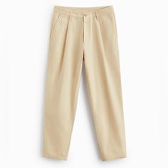 Zara Carrot Fit Pants In Beige Size 29 Nwt Carrot-Cut Trousers With A Pleat At The Front. With Front Pockets, Back Welt Pockets And A Zip Fly And Top Button. 100% Cotton Zip Fly Button Closure 2 Back Pocket 2 Front Side Pockets Belt Loops Inseam 27.5” 6861/317/710 Items Are Retail Store Purchases And May Have Been Handled Or Tried On By Store Customers Prior To Sending, Photos Are Taken Of Item With A Zip Tag Attached To Represent The Item Purchased Beige High-waisted Chinos With Pockets, Beige Ankle-length Chinos For Work, Zara Cotton Tapered Leg Pants, Zara Tapered Leg Cotton Pants, Zara Casual Pants With Tapered Leg, Zara Casual Tapered Leg Pants, Zara Casual Straight Chinos, Casual Tapered Leg Pants By Zara, Casual Straight Chinos By Zara