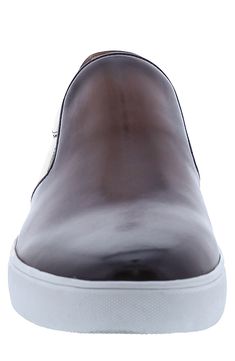 Smooth leather shapes this handsome slip-on sneaker lifted by a bold white sole and offers premium comfort with soft memory foam cushioning. Leather upper and lining/rubber sole Imported Brown Low-top Slip-ons With Contrast Sole, Modern Brown Sneakers With Translucent Outsole, Brown Leather Modern Slip-on Sneakers, Modern Brown Leather Slip-on Sneakers, Brown Leather Slip-on Sneakers With Contrast Sole, White Slip-on Sneakers With Abzorb Midsole, Brown Slip-on Sneakers With Contrast Sole, Modern Brown Slip-ons With Rubber Sole, Brown Leather Sole Slip-on Sneakers