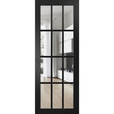 an open black door with glass on the inside and outside doors in front of it