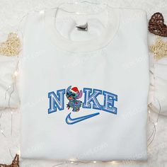 Stitch Xmas x Nike Embroidered Shirt, Christmas Embroidered Hoodie, Best Gift Ideas For Family Winter Streetwear Top With Machine Embroidery, White Embroidered Sweatshirt For Winter, Casual Winter Hoodie With Machine Embroidery, Winter Cotton Hoodie With Machine Embroidery, Winter Hoodie With Crew Neck And Machine Embroidery, Winter Cotton Sweatshirt With Multicolor Embroidery, Winter Multicolor Embroidered Cotton Sweatshirt, Winter Embroidered Multicolor Sweatshirt, Gift Ideas For Family