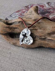 "You can find more silver treasures in my shop! Click here: https://www.etsy.com/shop/SeasideSilverJewels Or follow me on Facebook: https://www.facebook.com/SeasideSilverJewels/ Two very precious things...a cross and a heart all wrapped up in one fine silver piece. The Forget Me Not flower has a place in everyone's heart and ensures that we hold on to those heart warming memories. SIZE AND DETAIL: See pictures for dimensions. Each pendant contains approximately 4.0 grams of fine silver. I handcr Silver Bohemian Heart Necklace Gift, Silver Bohemian Heart Necklace As Gift, Handmade Open Heart Jewelry As Gift For Mom, Handmade Open Heart Jewelry For Mom, Nature-inspired Silver Heart Necklace, Handmade Silver Heart Necklace For Mom, Handmade Silver Heart Necklace As Gift For Her, Handmade Silver Heart Necklace Gift For Her, Handmade Silver Heart Necklace For Her