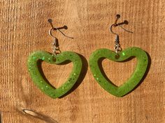 Big green hearts earrings with lots of glitters Green Heart Beads Earrings For Gift, Green Earrings With Heart Beads For Gifts, Cute Green Jewelry For Party, Green Heart Drop Earrings For Gifts, Green Heart-shaped Earrings For Valentine's Day, Handmade Green Earrings For Valentine's Day, Green Heart-shaped Earrings For Gifts, Green Heart Earrings For Valentine's Day Party, Green Heart Shaped Earrings For Parties