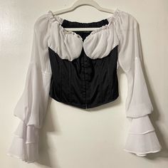 Brand New! Rumor Has It Satin Corset With Chiffon Sleeves Shop Akira Medium Black And White White Fitted Top For Costume Party, Fitted Black Chiffon Blouse, Fitted Black Chiffon Top, White Satin Corset, Black Mesh Crop Top, White Silk Top, Turquoise Blouse, Pirate Outfit, Chiffon Sleeves