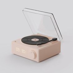 an alarm clock with a record player on it