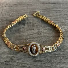 Gold plated San Judas bracelet Bracelet measurement: 8” long, 8MM wide San Judas Ring, Keychain Necklace, Gold Plated Bracelets, Anklet Bracelet, Evil Eye Necklace, Evil Eye Bracelet, Evil Eye Jewelry, Flower Bracelet, Eye Jewelry