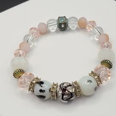 White and pink glass beaded stretch bracelet. A bit smaller in size but has plenty of give in the cord. Rhinstone spacers to give it some sparkle. Tie Styles, Beaded Stretch Bracelet, Pink Glass, Stretch Bracelet, Stretch Bracelets, Hippie Boho, Etsy Accessories, Glass Beads, Cape