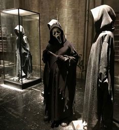 two mannequins dressed as darth vader and nun from star wars