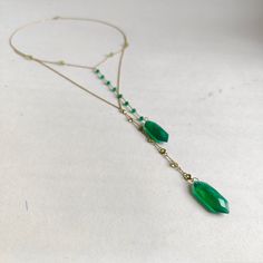 "**Details of the Necklace: Length of necklace is 16 inches. Gem : Green Onyx Gem shape, size :Fancy, 40×11 mm (L×B)  (2 piece ) Gem Weight : 17.80 cts    Round  green onyx Beads, 4.00 mm ( 8 piece ) Beads weight : 1.6 CTS Gem: Peridot Gem Shape &  size : Round, 3 mm  ( 7 piece ) Gem Weight : 0.96 cts Round  peridot beads, 4 mm (4 piece ) Beads Weight : 1.75 cts Total Gem weight: 22.11 carats Metal: GOLD Purity: 14K (58.33%)approx Gold Weight: 2.52 grams Gross weight: 6.94 grams The necklace com Elegant Faceted Chrysoprase Jewelry, Green Lariat Jewelry For Formal Occasions, Formal Green Lariat Jewelry, Yellow Gold Chrysoprase Jewelry For May Birthstone, Formal Gold Chrysoprase Jewelry, Leo Birthstone, Handmade Jewelry Box, Unique Pendant Necklace, Personalized Pendant