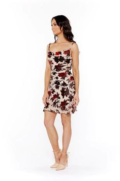 Velvet floral detail mini dress with adjustable shoulder straps, tie back, and waist details Flirty Mini Dress With Tie Straps For Evening, Flirty Tie Strap Dress For Date Night, Flirty Dress With Tie Straps For Date Night, Evening Mini Dress With Tie Straps, Mini Dress With Tie Straps For Brunch, Strapped Knee-length Evening Dress, Strappy Cocktail Mini Dress, Brunch Mini Dress With Tie Back And Straight Neckline, Fitted Mini Dress With Tie Straps