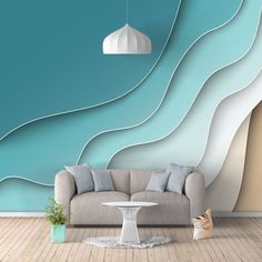 a living room with a couch and table in front of a blue wall that has wavy lines on it