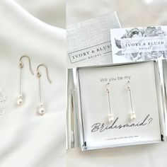 two pairs of pearl earrings in a gift box with the words ivory & bliss written on it