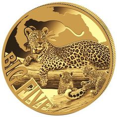 a gold coin with an image of two cheetah and one leopard on it